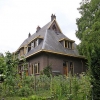 The rear side of our house with our vegetable garden
